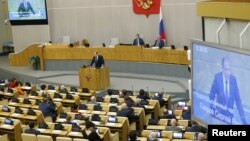 FILE - Russian Foreign Minister Sergei Lavrov delivers a speech during a session at the State Duma, the lower house of parliament, in Moscow, Russia, June 15, 2016. 