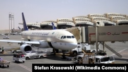 A Saudi Arabian Airlines A320 is parked at the King Khalid International Airport, Riyadh. The Saudi military intercepted a ballistic missile fired from Yemen, Nov. 3, 2017, that was aimed at the airport. 