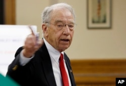 FILE - Sen. Chuck Grassley, R-Iowa speaks at a town hall meeting in Greenfield, Iowa, June 2, 2017.