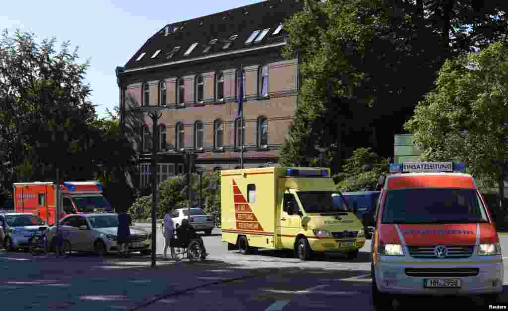 An employee of the World Health Organisation (WHO), who contracted Ebola in Sierra Leone arrives at the 'Universitaetsklinikum Hamburg-Eppendorf ' (University Clinic Eppendorf- UKE) in an ambulance, in Hamburg, Aug. 27, 2014.