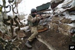 Ukrajinski vojnici na frontu na Istoku zemlje, Foto: AP