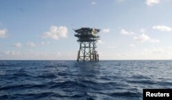 FILE - A Vietnamese floating guard station is seen on Truong Sa islands, or Spratly island.