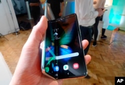 The Samsung Galaxy Fold smartphone is seen during a media preview event in London, April 16, 2019.