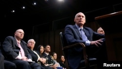 Director of National Intelligence Dan Coats testifies before the Senate Armed Services Committee on worldwide threats, on Capitol Hill in Washington, March 6, 2018.