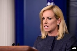 FILE - Department of Homeland Security Secretary Kirstjen Nielsen speaks at the White House in Washington, June 18, 2018.