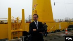 Bruno Geschier, marketing manager for Ideol, one of the companies involved in the Floatgen turbine. (VOA / L. Bryant)