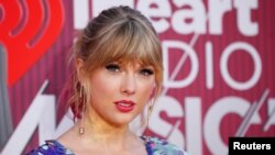 La cantante Taylor Swift llega a los iHeartRadio Music Awards en Los Ángeles, California, EE. UU., 14 de marzo de 2019. REUTERS / Mario Anzuoni.