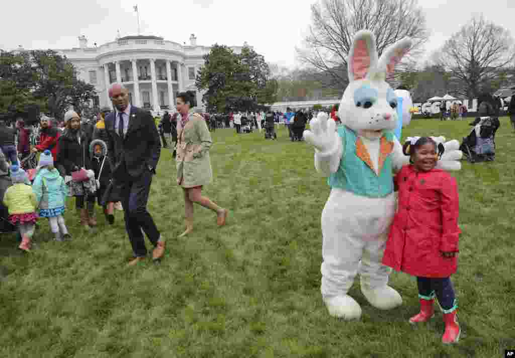 Guests participate in activities during the annual White House Easter Egg Roll on the South Lawn of the White House in Washington, Monday, April 2, 2018. (AP Photo/Pablo Martinez Monsivais)