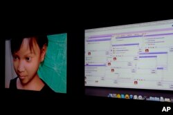 Persons solicit a purported 10-year-old Filipino girl, shown at left in a computer-generated image, through a public chat room, right, while actually chatting to a Terre des Hommes researcher during a media opportunity in Amsterdam, Netherlands in November 2013. The Dutch children’s rights organization, seeking to focus attention on the problem of cybersex child trafficking, created the fake 10-year-old girl, and she was bombarded with online offers to pay for webcam sex shows by child predators from around the world.
