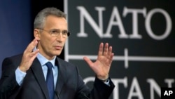 NATO Secretary-General Jens Stoltenberg speaks during a media conference at NATO headquarters in Brussels, Nov. 7, 2017. 