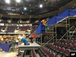 Workers prepare a camera platform inside Quicken Loans Arena in preparation for the Republican National Convention in Cleveland, June 28, 2016. No one will be able to carry weapons inside the smaller, secured area surrounding the arena, which will be controlled by the Secret Service.