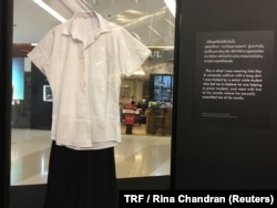 A display at an exhibition featuring clothing worn by victims at the time of sexual assault in Bangkok, Thailand, June 29, 2018.