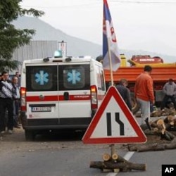 Local Serbs block access to border crossing in Jarinje on Kosovo-Serbia border to protest against Kosovo special police units operation overnight to take control of two disputed border crossings in Kosovo's northern Serb-run border region, July 26, 2011