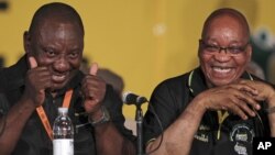 African National Congress (ANC) re-elected President Jacob Zuma, right, with his new deputy Cyril Ramaphosa, left, during their elective conference at the University of the Free State in Bloemfontein, South Africa, December 18, 2012.