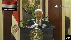 Egyptian state television Al-Masriya shows new Egyptian Prime Minister Ahmed Shafiq holding a press conference in Cairo, February 3, 2011