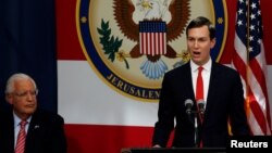 U.S. Ambassador to Israel David Friedman sits next to White House Senior Adviser Jared Kushner as he speaks during the dedication ceremony of the new U.S. embassy in Jerusalem, May 14, 2018.