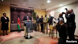 Deputy Kenyan President William Ruto addresses the media at a news conference at the Movenpick Hotel in the Hague, Netherlands, Oct.15, 2013. 