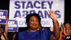 Democratic candidate for Georgia governor Stacey Abrams waves to supporters after speaking at an election-night watch party, May 22, 2018, in Atlanta, Georgia.