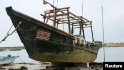 Unidentified wooden boat which was found in the sea off Noto Peninsula, is seen in Wajima, Japan, in this photo taken by REUTERS/Kyodo on November 29, 2015. 