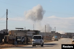 Smoke rises in a site hit by what activists said were airstrikes carried out by the Russian air force in the town of Saraqeb, in Idlib province, Syria, Jan. 9, 2016.