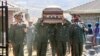 The coffin of Lesotho's Army Lieutenant General Khoantle Motsomotso is carried at his funeral in Malibamatso, Sept. 14, 2017. 
