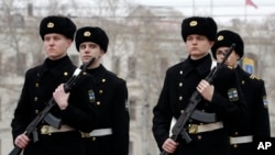 Ukrainian sailors march in the Ukrainian Black Sea port of Sevastopol in the Crimea, Ukraine, Feb. 24, 2014. 