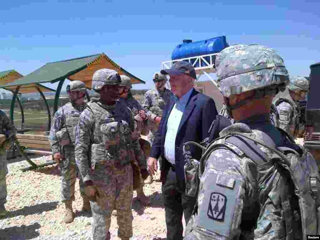 U.S. Senator John McCain meets with U.S. troops in southern Turkey, May 27, 2013. &nbsp;He also visited rebels inside Syria. &nbsp;This picture was released on his Twitter account. 