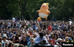 Một khí cầu mang hình Tổng thống Donald Trump xuất hiện trong cuộc biểu tình ở Edinburgh, Scotland, ngày 14 tháng 7, 2018.