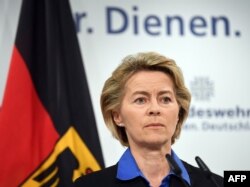 FILE - German Defense Minister Ursula von der Leyen delivers a statement in Berlin, July 26, 2017.