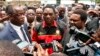FILE - Opposition United Party for National Development president Hakainde Hichilema (C) talks to journalists in Lusaka, March 2, 2016.