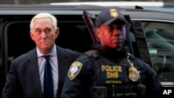 Former campaign adviser for President Donald Trump, Roger Stone arrives at Federal Court, Tuesday, Jan. 29, 2019, in Washington.