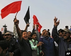 Supporters of Nepal's Mohan Baidya-led Maoist faction protest in Katmandu against the country's four main parties to integrate one-third of the former Maoist rebels into the army and give money to the remainder, November 2, 2011.