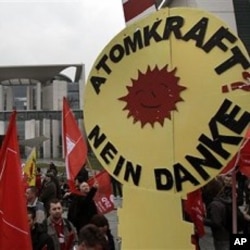 Protesters against nuclear energy demonstrate in front of the chancellery in Berlin, Germany, March 14, 2011