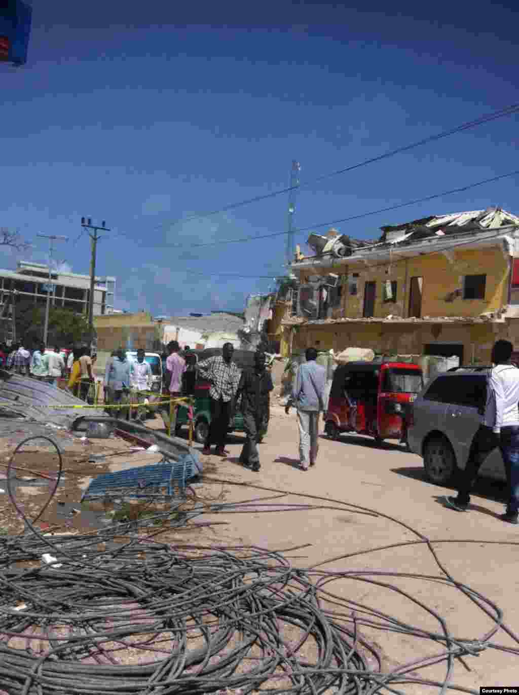 A photo, provided to VOA's Somali Service, shows the destruction of Naso-Hablod hotel and surrounding areas, in Mogadishu, Somalia, June 26, 2016. The photo was taken by a bystander who wished to remain anonymous.