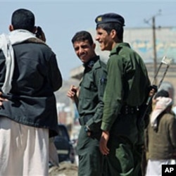 Yemeni police are seen at a checkpoint in the capital San'a, Yemen, 01 Nov 2010