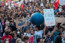 Demonstrators representing various causes march in Rome, Oct. 30, 2021, the day a G-20 summit started in the Italian capital.