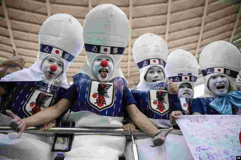 Japan fans support their team prior to the start of the group H match between Japan and Senegal at the 2018 soccer World Cup at the Yekaterinburg Arena in Yekaterinburg, Russia.