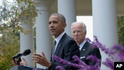 Perezida Barack Obama, arikumwe na Visi Perezida Joe Biden,avuga Kumatora