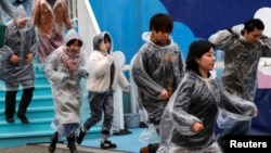 Warga Jepang melakukan latihan evakuasi sipil menghadapi ancaman misil Korea Utara di Tokyo, 22 Januari 2018 lalu. 