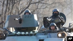FILE - South Korean soldiers ride an armored during an annual exercise in Paju, near the border with North Korea.