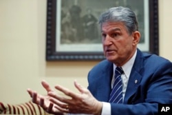FILE - Sen. Joe Manchin, D-W.Va., is pictured during an interview in his office in Washington, Feb. 1, 2017.