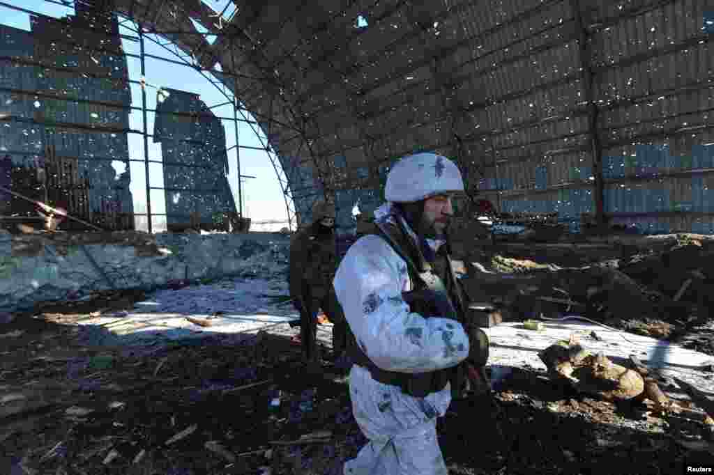 Ukrainian servicemen are seen at their position on the front line near the government-held town of Avdiyivka, Ukraine.