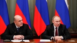 Russian President Vladimir Putin and Prime Minister Mikhail Mishustin hold a meeting with members of the new government in Moscow, Russia January 21, 2020. Sputnik/Dmitry Astakhov/Kremlin via REUTERS