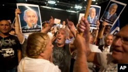 Supporters of Israel's Prime Minister Benjamin Netanyahu attend a Likud Party conference in Tel Aviv, Israel, Aug. 9, 2017. 