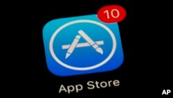 FILE - Apple's App Store app is seen on a smartphone in Baltimore, March 19, 2018.
