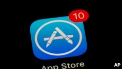 FILE - Apple's App Store app is seen on a smartphone in Baltimore, March 19, 2018.