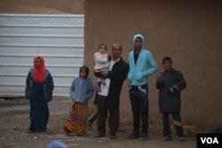 Villagers in Bashmana say that after Iraqi forces took their village from IS militants, normal life began to return, but they are still short of food, electricity, running water and medicine, Dec. 16, 2016. (H. Murdock/VOA)