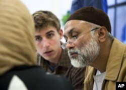 Zaytuna College is offering summer language classes in preparation for its official fall opening. (left to right) David Burkhart and Shahid Bhuihan