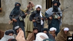 FILE - Afghan Taliban fighters are shown Nov. 3, 2015. The U.S. and Afghanistan accuse Pakistan of providing a safe haven to the Afghan Taliban.