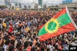 FILE - People gather to celebrate the return of the formerly banned anti-government group the Oromo Liberation Front (OLF) at Mesquel Square in Addis Ababa, Ethiopia, Sept. 15, 2018.